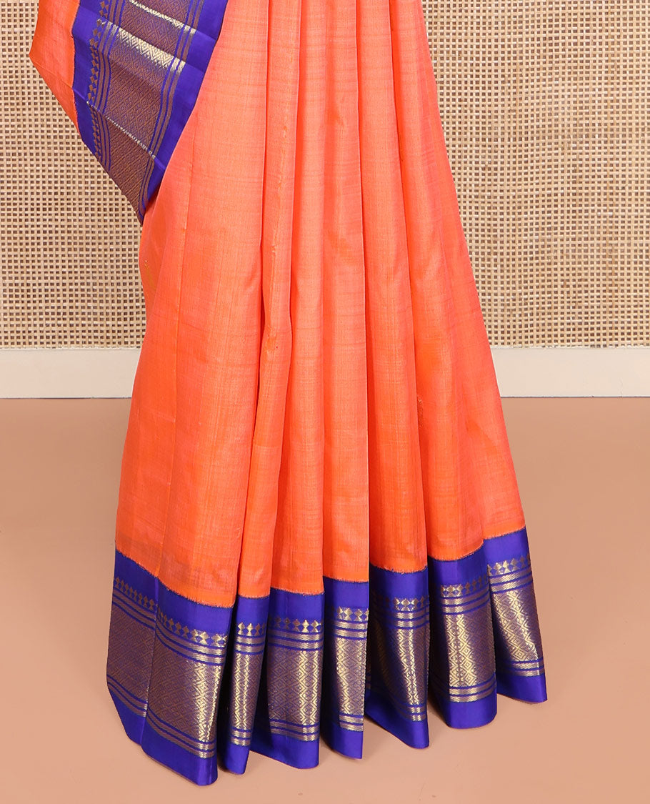 Orange Kanchipuram Silk Saree, Decorated with Zari Buttas on Its Body, Complemented by Contrast One-Sided Korvai Border of Panner Sombu, Banaras, and Jaal Designs, Pallu Features Zari Designs, and Comes Without a Blouse
