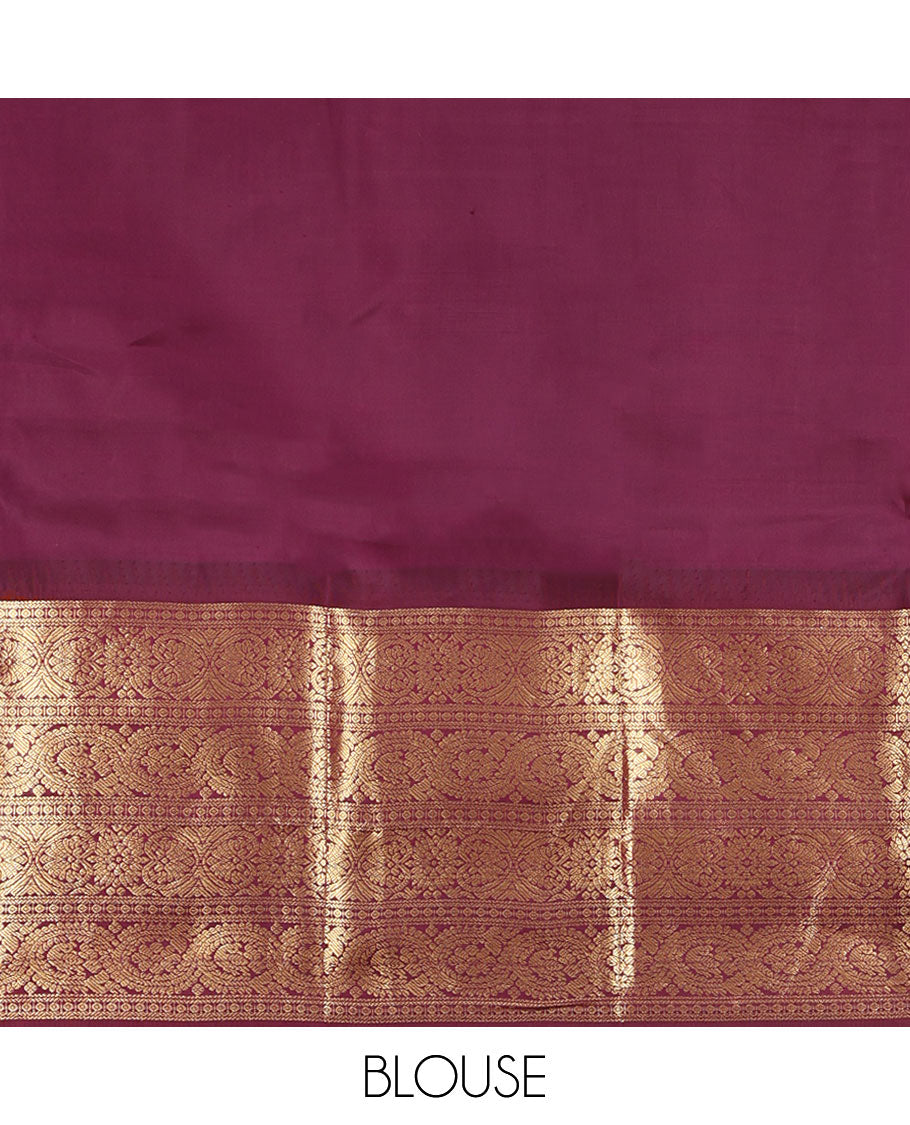 Sea Green Vasundhara Silk Saree, Accentuated with Zari Buttas All Over Its Body, Complemented by Contrast Border of Ara Bogudi, Banaras, Jada Nagam and Dhavana Kodi Designs, Pallu of Intricate Designs, and Paired with a Contrast Blouse