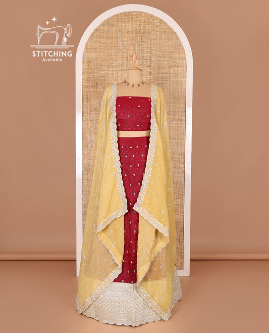 Red half-saree, floral motifs embroidered semi-raw silk top, matching embroidered blouse, and contrast scallop embroidered georgette dhavani