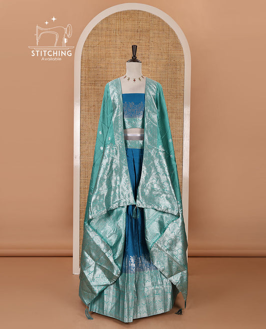 Blue-green taffeta silk half-saree, zari buttas & contrast floral-geometric zari border skirt, zari woven blouse & contrast zari woven dhavani