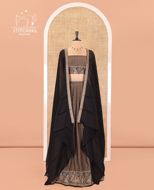 Chikku and Black Mercerised Cotton Half-Saree Set, Plain with Dancing Figurines Woven Bordered Skirt, Paired With a Matching Blouse, and Comes with a Contrast Dhavani