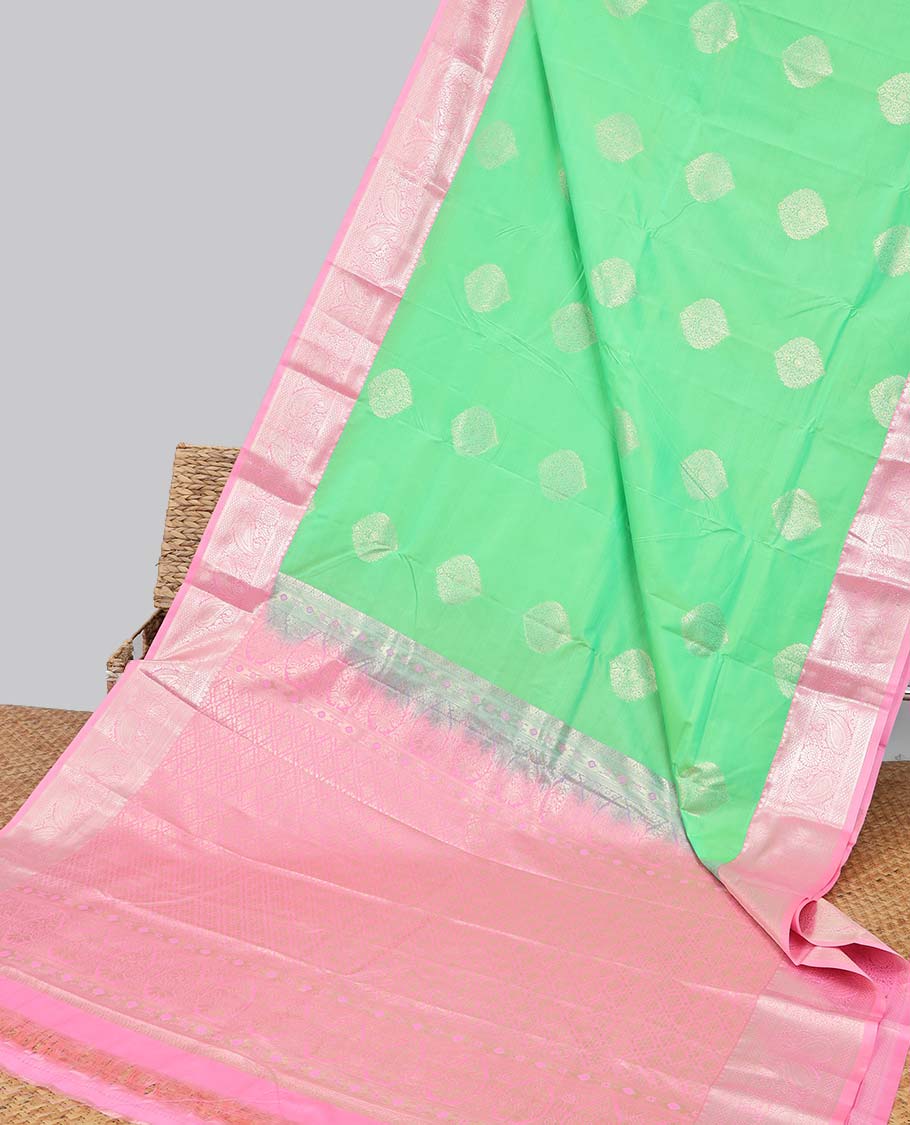Green floral motifs gift saree with contrast paisley border & intricate zari design pallu