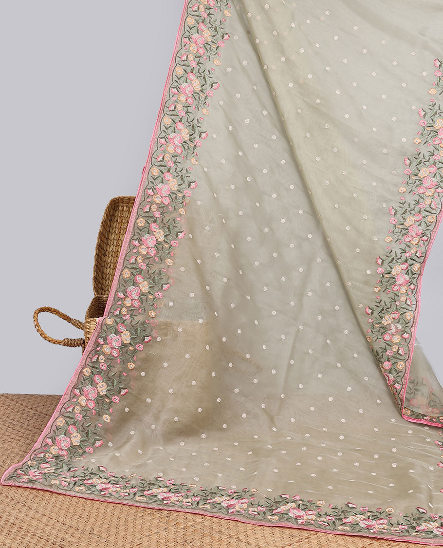 Light green motifs embroidery net designer saree with self floral border & floral embroidery pallu 