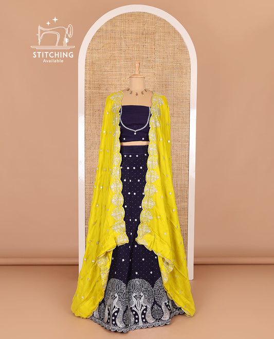 Violet half-saree, buttas, tree, and peacock motifs embroidered semi-taffeta silk top, matching blouse, and contrast scallop embroidered dhavani