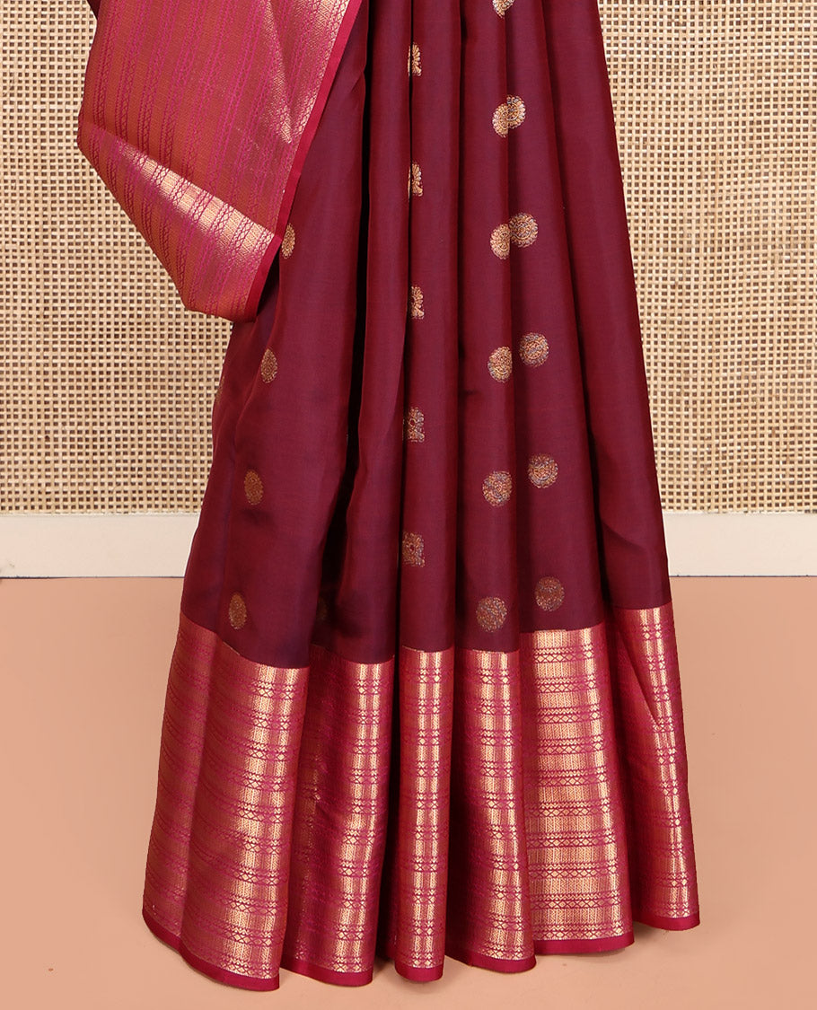 Maroon Vasundhara Lite Silk Mix Saree Features Mayil-Chakram Buttas, Complemented by a Contrast Border of Neli and Diamond, a Geometric Pallu, and a Contrast Blouse