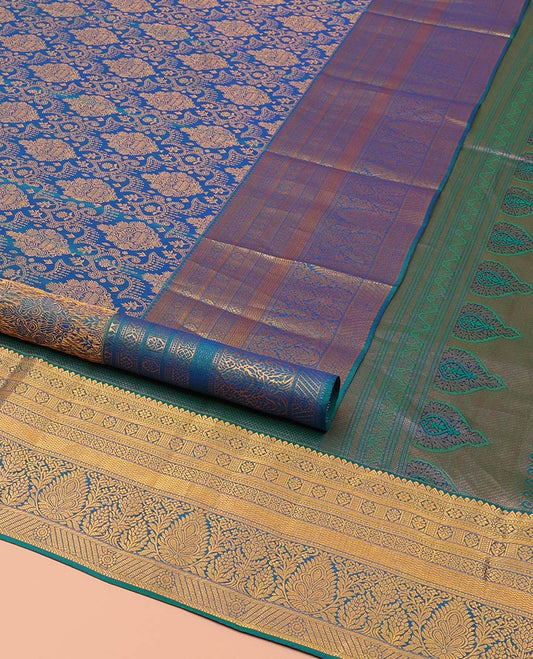 Blue Samudrika Silk Saree, Ornamented with Jacquard Design on Its Body, Highlighted by Zari Border of Rekku, Banaras, Cross Kamalam, Vanki, and Kodi Visiry Designs, Meticulously Crafted Pallu, and Paired with a Matching Blouse