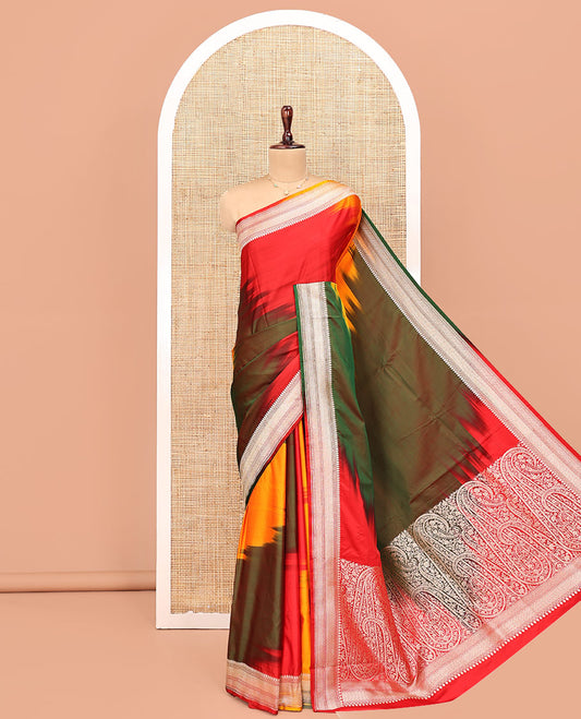 Multi-Color Banarasi Silk Saree, Mesmerized with Colorful Ikkat Weave on Its Body, Highlighted by a Self-Border of Traditional Designs, Pallu of Big Paisley Designs, and Paired with a Matching Jacquard Blouse