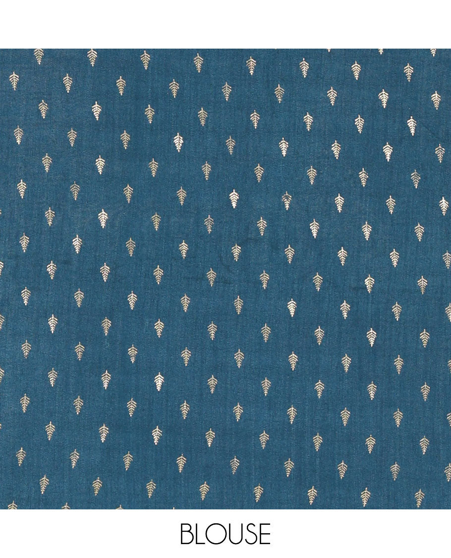 Cream-peacock blue Vichitra half-saree, plain and contrast bordered skirt, contrast leaf buttas blouse, dhavani of buttas and floral creeper designs