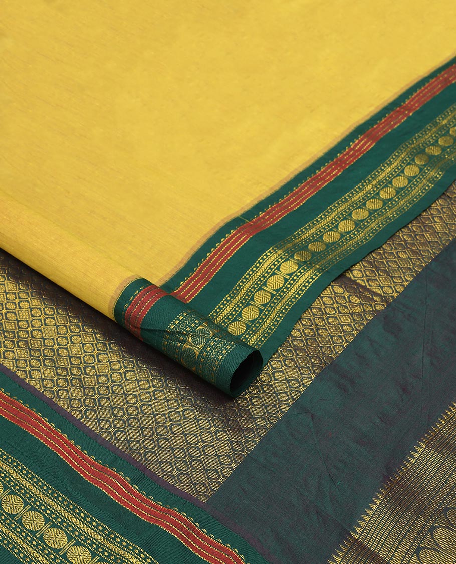 Yellow nine yards cotton saree with contrast zari design border & ogee design pallu