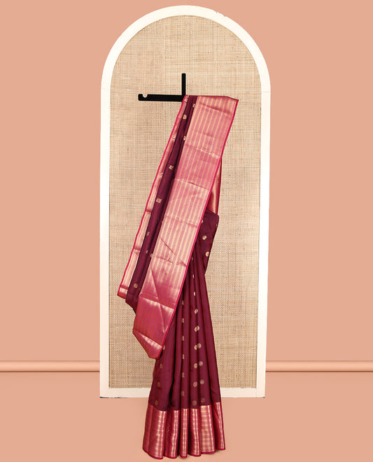 Maroon Vasundhara Lite Silk Mix Saree Features Mayil-Chakram Buttas, Complemented by a Contrast Border of Neli and Diamond, a Geometric Pallu, and a Contrast Blouse