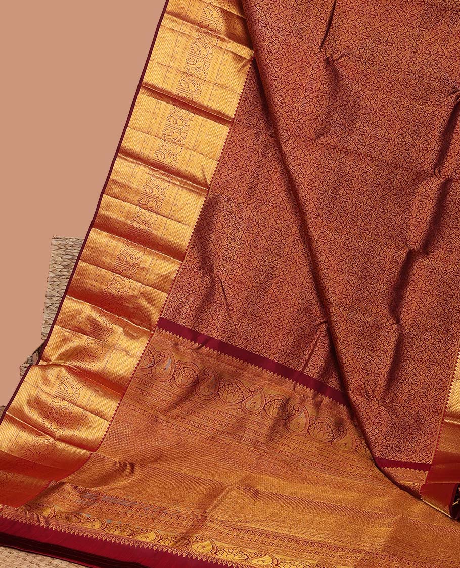 Maroon floral jacquard silk saree with contrast border of rekku,myil,kuyil kann designs & striped floral zari pallu