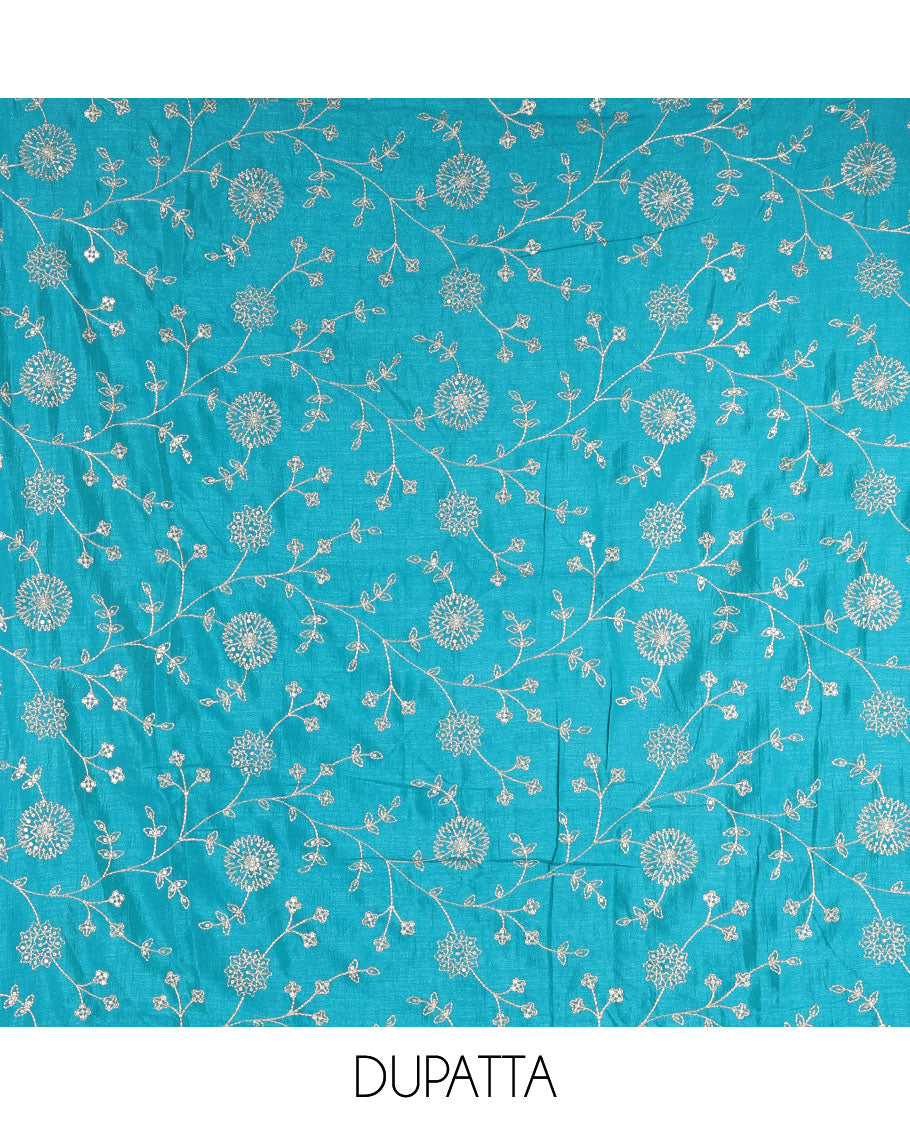 Mustard Vichitra silk material churidar set, floral motifs embroidered top, contrast Santoon bottom, and floral vine thread embroidered scallop dupatta