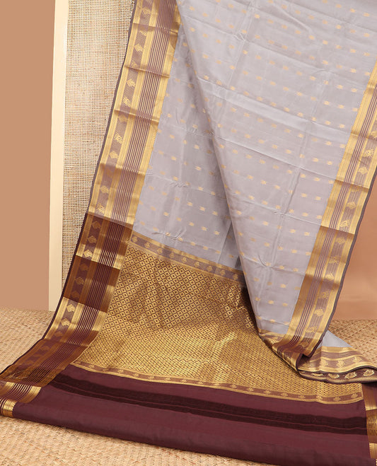 Grey floral buttas vasundhara elite silk saree with contrast intricate zari design border & ogee design pallu