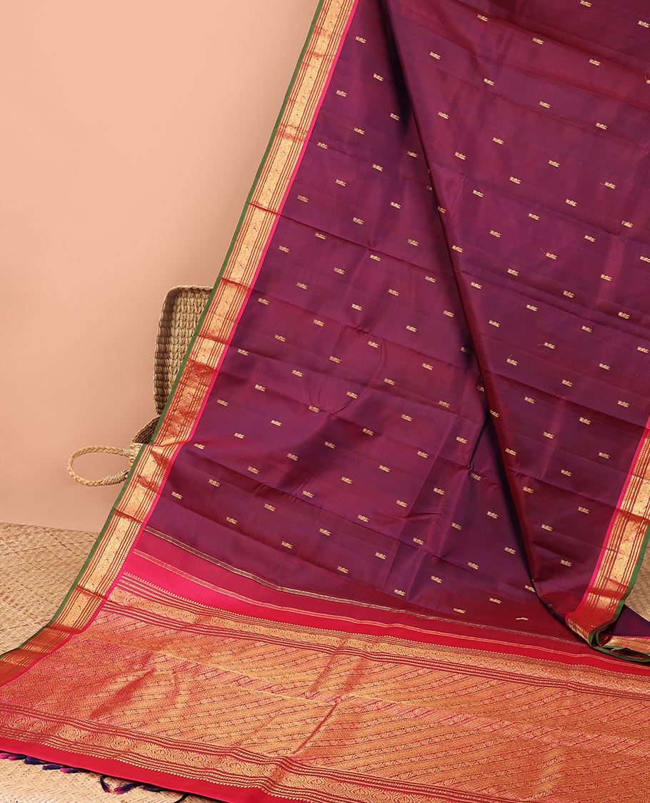 Maroon buttas kancheepuram silk saree with contrast border of sombu, banaras, paun designs & zari design pallu