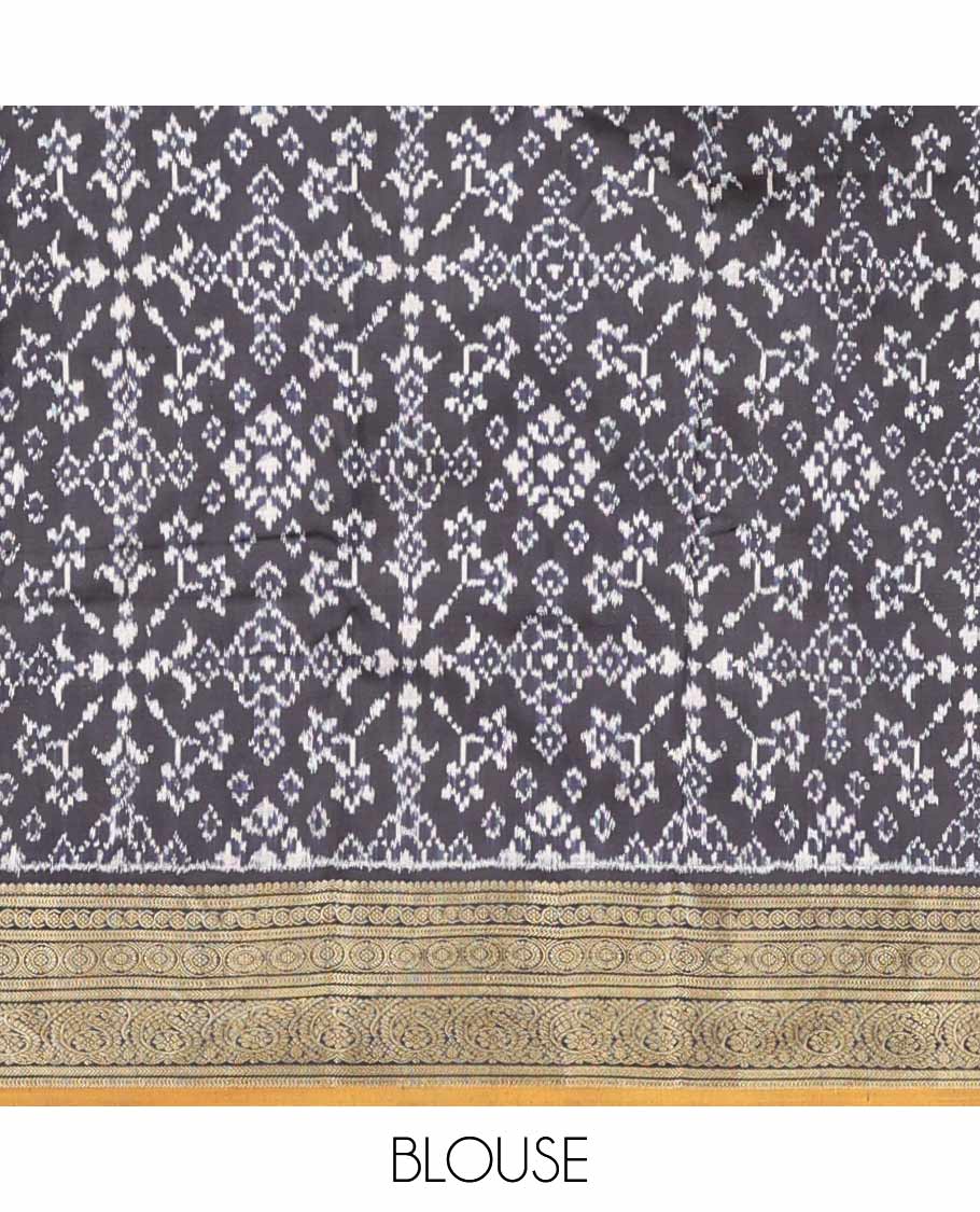 Black geometric, floral & animal design ikkat saree with contrast zari design border & traditional zari design pallu