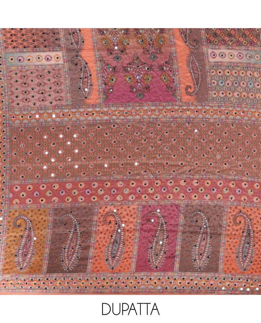Orange churidar material set, Ajrakh-printed neck with Schiffli embroidery & mirror work georgette top, kalidoscopic-colored dupatta of ajrakh print & mirror embroidery & plain crepe bottom