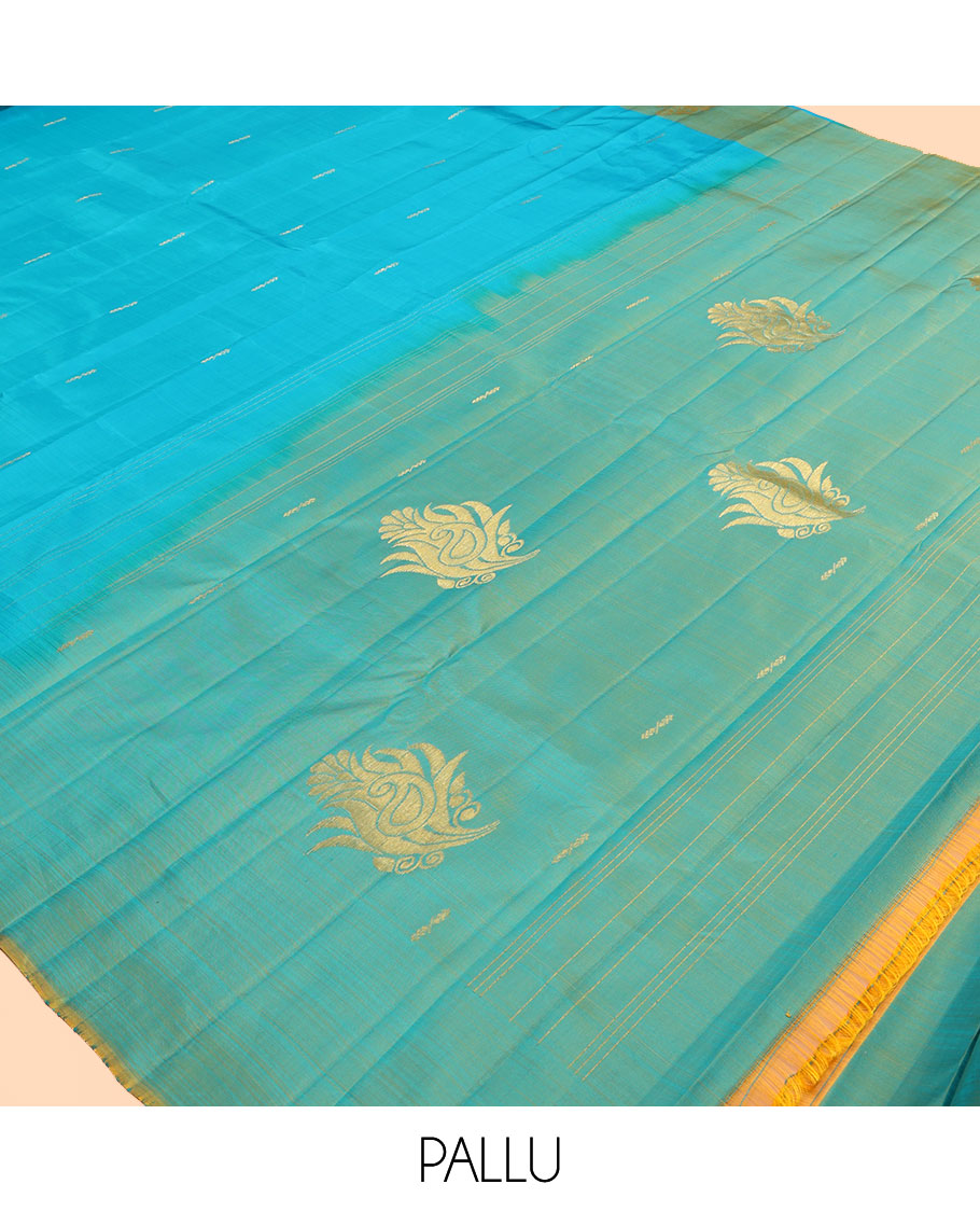 Blue Kanchipuram Silk Saree, Woven with Buttas, a Contrast Zari Buttas Border, Zari Design Pallu, and a Contrast Blouse
