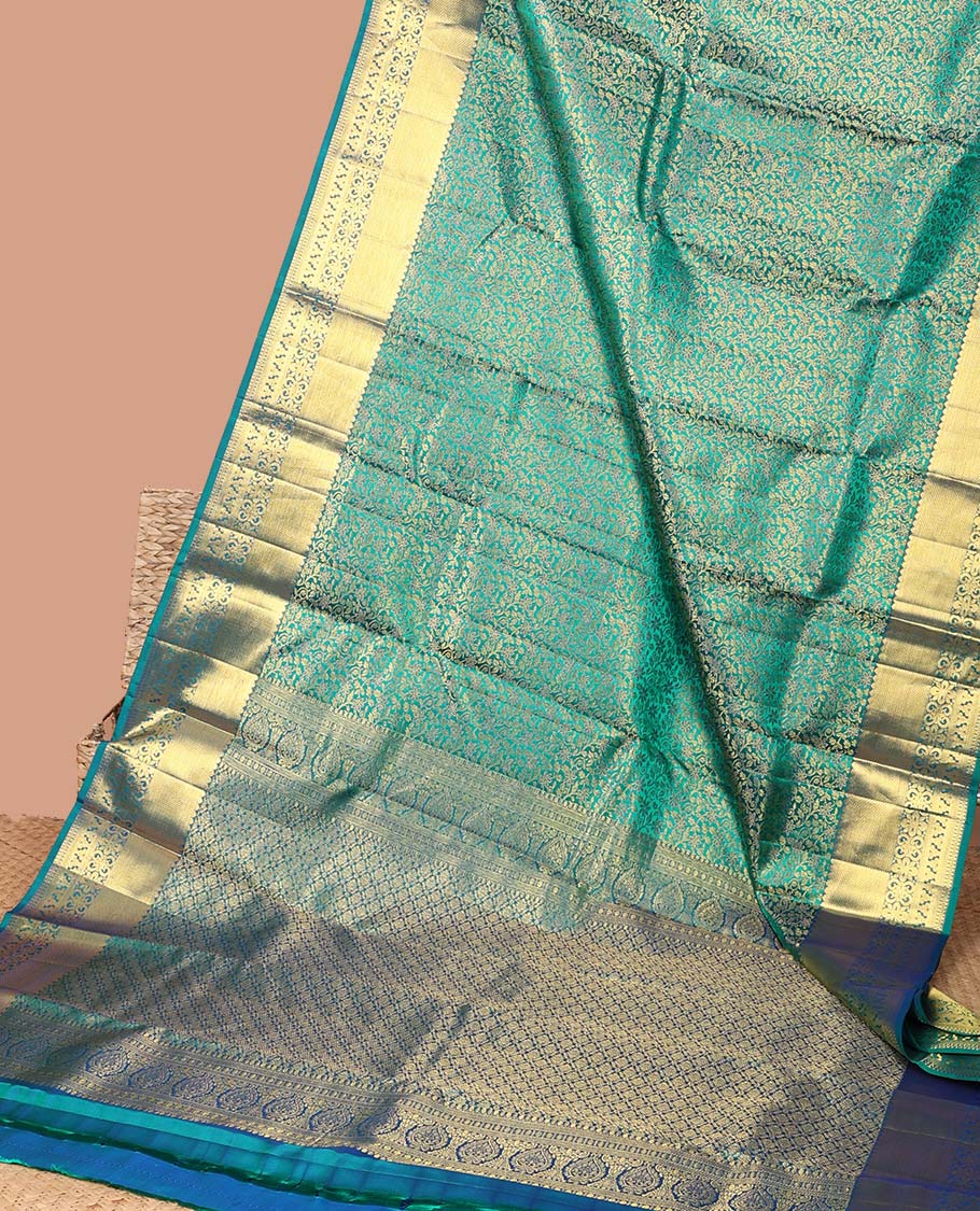 Green floral jacquard kancheepuram silk aree with self intricate zari border & argyle zari design pallu