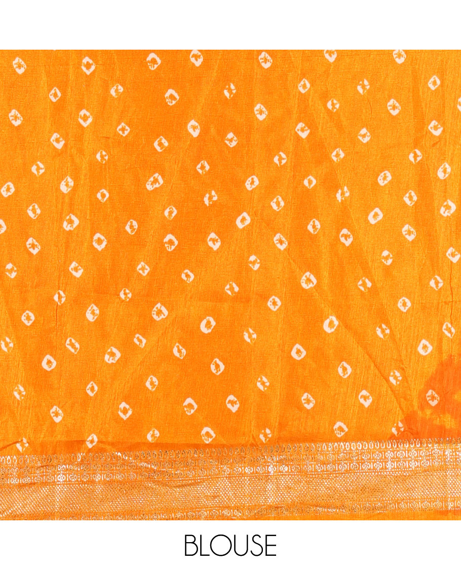 Cream and yellow semi-tussar half-saree, shibori printed with contrast geometric patterned bordered skirt, bandhani printed blouse, and bandhani printed dhavani