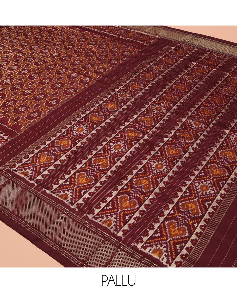 Brown Ikkat Silk Saree, Elevated with Ikkat Checks All Over Its Body, Subtle Border of Jaal Designs, Pallu of Geometric Designs, and Paired with a Matching Blouse