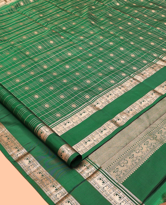 Green Kanchipuram Silk Saree, Detailed with Buttas and Checks, a Zari Rettai Pettu Border of Thazampoo Rekku, and Mayil Designs, Grand Pallu, and a Matching Blouse