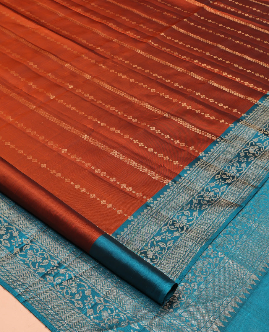 Rust Mayuri Lite Silk Mix Saree, Finely Crafted with Zari Designs All Over Its Body, Complemented by a Contrast Border of Vanki and Floral Designs, Beautifully Bedecked Pallu, and Paired with a Contrast Blouse