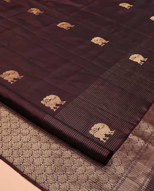 Brown Mayuri Soft Silk Saree, Artfully Woven with Yaali Buttas All Over Its Body, Highlighted by Scallop Design Pallu, and Paired with a Matching Blouse