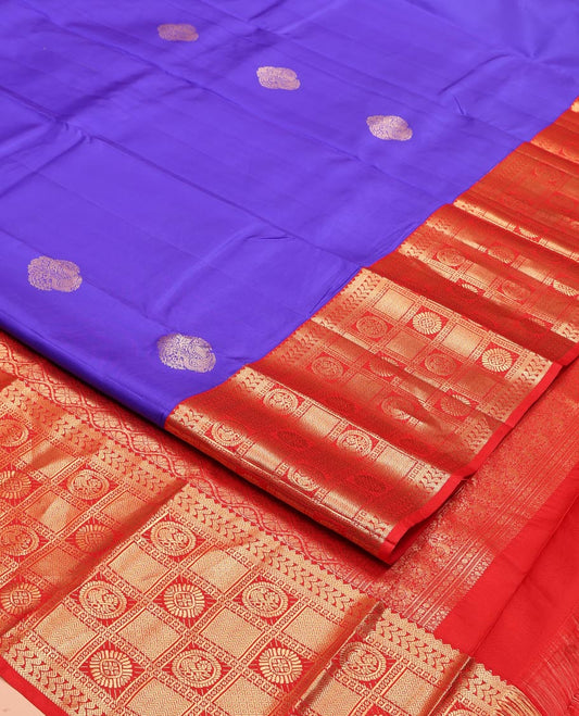 Violet Vasundhara Silk Saree, Prettified with Zari Buttas All Over Its Body, Complemented by a Contrast Border of Rekku, Banaras, Kathir, Chakram, Round Mayil, and Mayil Kann Designs, Grand Ogee-Patterned Pallu, and Paired with a Contrast Blouse