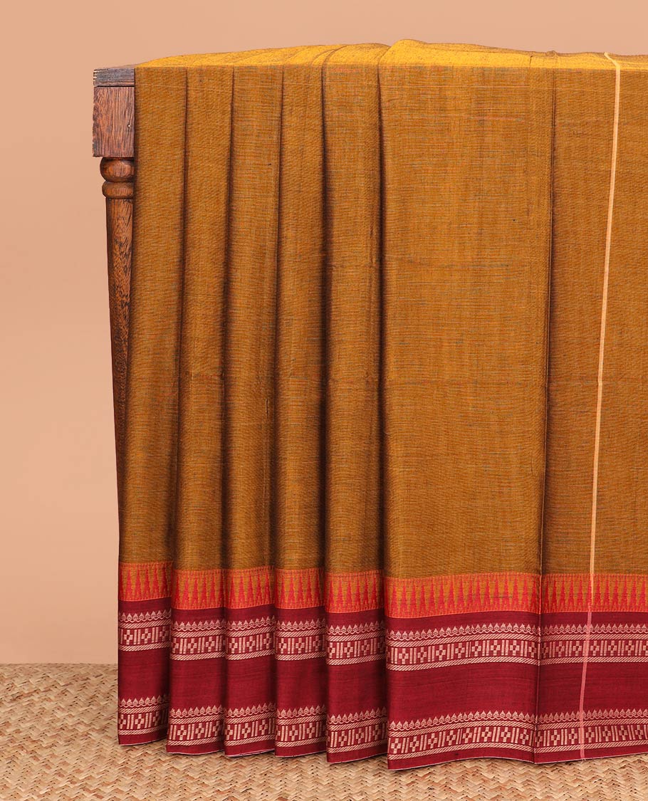 Mustard plain Narayanpet cotton saree, contrast rettai pettu temple traditional border, and striped pallu