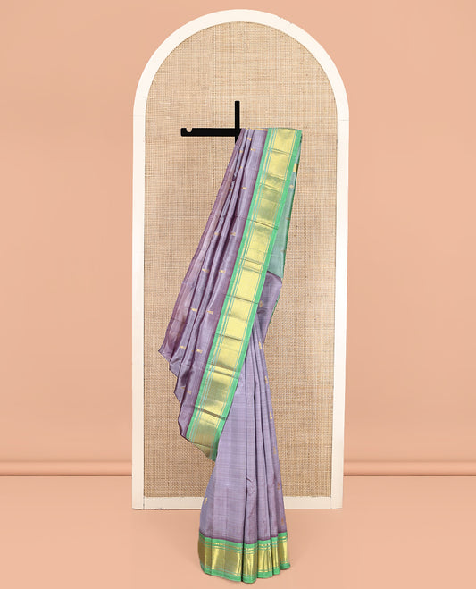 Grey Kanchipuram Silk Saree,  Detailed with Zari Buttas, a Contrast One-Sided Border of Rekku, Banaras, and Jaal Designs, Zari Design Pallu, and No Blouse