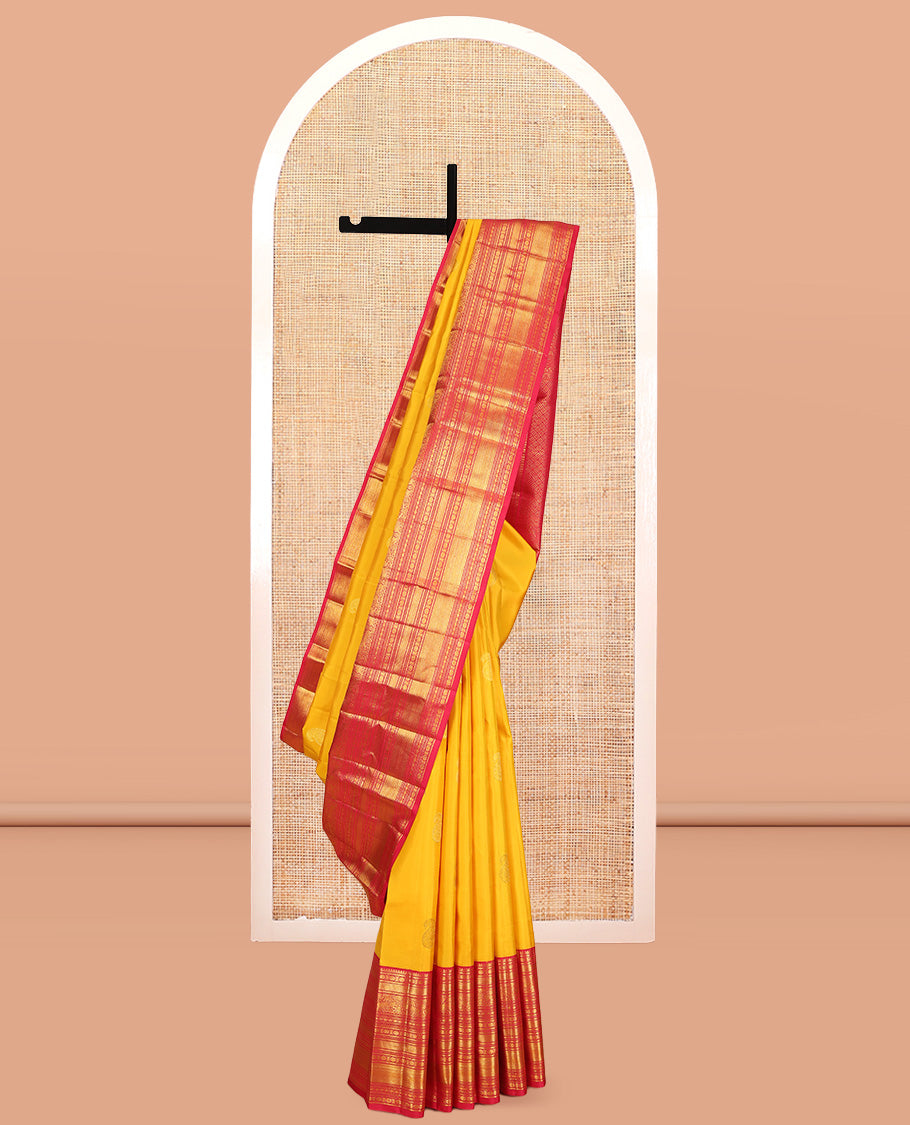Yellow Kanchipuram Silk Saree, Embellished with Manga Buttas, a Contrast Korvai Border of Thilakam Mokku, Chakram, Then Kuli Kann, Kuthirai, and Poun Designs, Jaal Pallu, and a Contrast Blouse