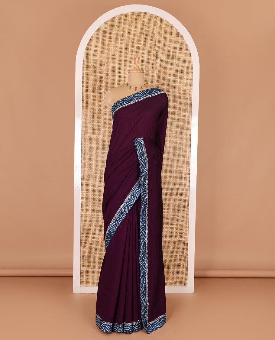 Wine plain Vichitra silk saree, contrast bandhani printed with Swarovski micro-stonework border, and a contrast bandhani printed blouse