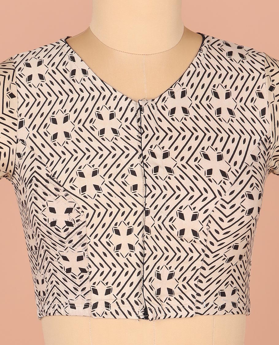 Off-White Readymade Blouse Prettified with Geometric Prints, Featuring a Front Round-Neck, a Back Closed Neck, and Elbow Sleeves