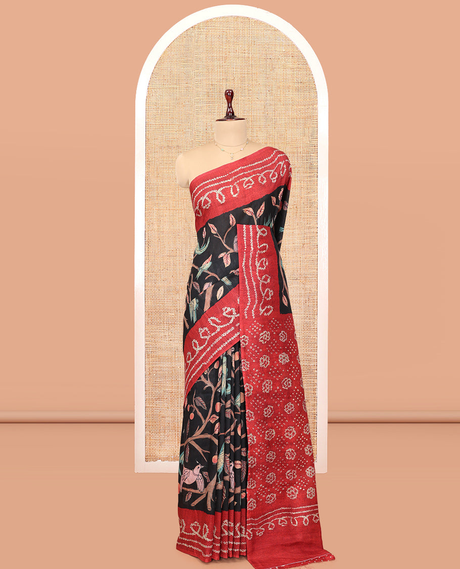 Black Fancy Tussar Saree Features Kalamkari Floral and Animal Print, Contrast Bandhani Border, Bandhani Pallu, and a Contrast Blouse