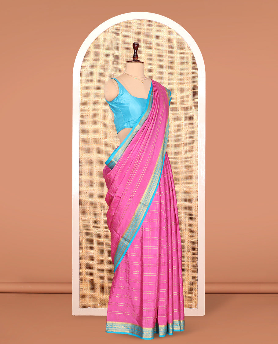 Pink Mysore Silk Saree, Gleamed up with Zari Checked Design on its Body, Complemented by Captivating Contrast Border of Traditional Zari Designs, Pallu of Tropical Flora and Flamingo Bird Designs, and Paired with a Contrast Blouse