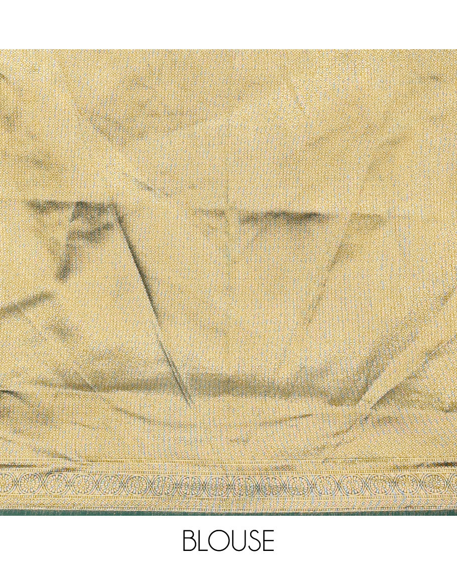 Gold-dark green zari buttas half-saree with contrast Mughal-style paisley motifs woven bordered skirt, brocade blouse, and a zari design dhavani