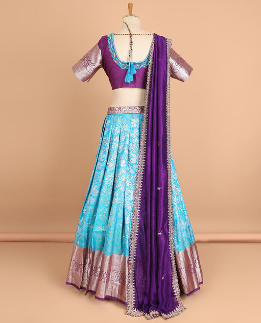 Blue jacquard art silk half saree with contrast zari design border , floral stone embroidery blouse & floral stone embroidered scallop border