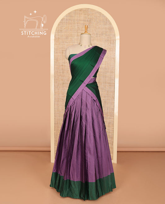 Purple checked cotton half saree with contrast border, plain blouse & plain dhavani