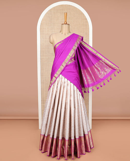 Cream floral jacquard art silk half saree with zari design border, zari design blouse plain, floral design dhavani