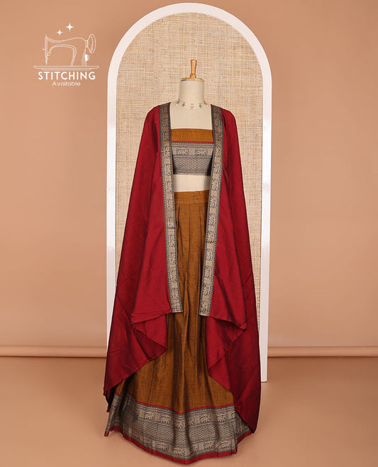 Brown cotton half saree with contrast elephant motifs border, elephant design blouse & elephant design border dhavani