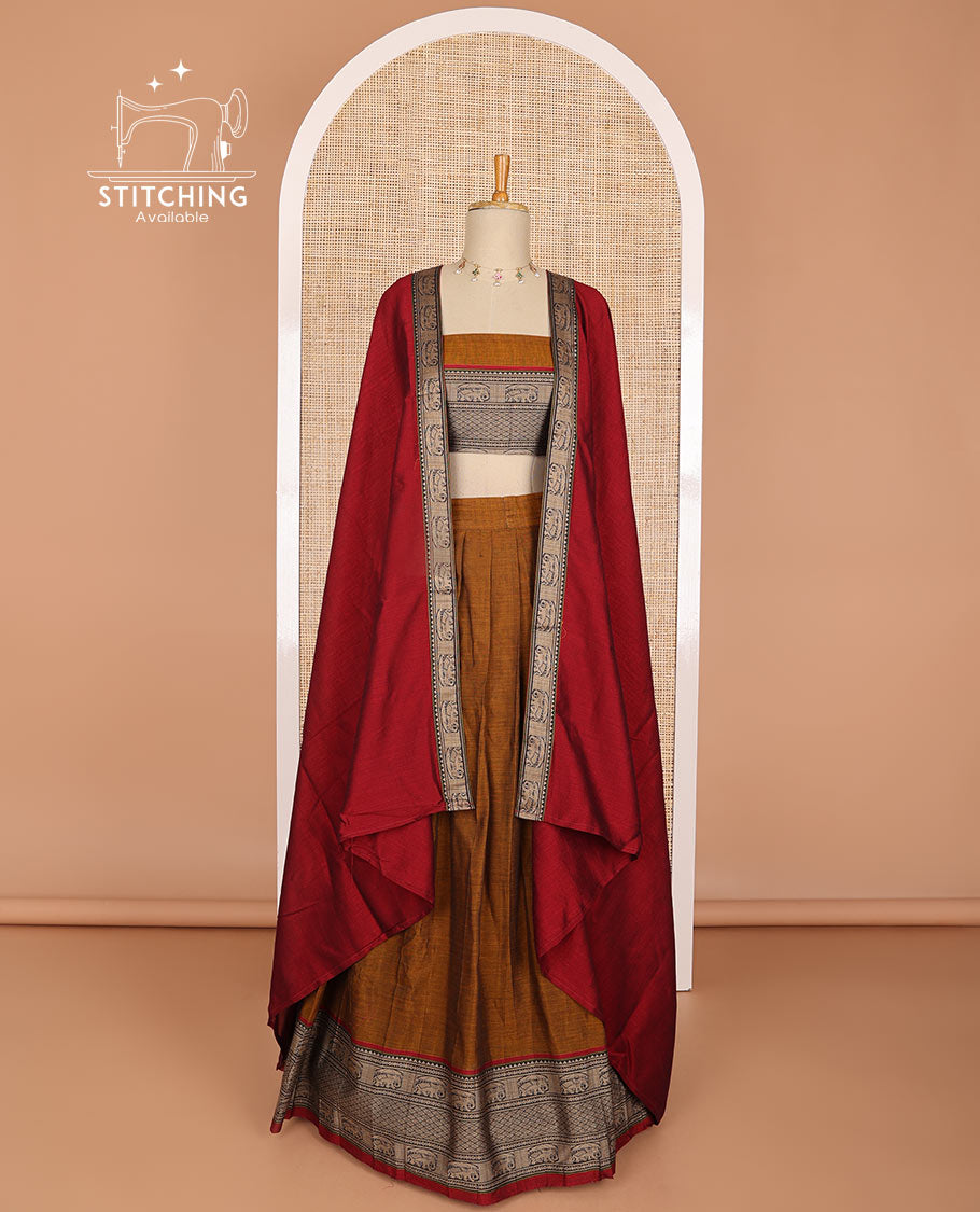 Brown cotton half saree with contrast elephant motifs border, elephant design blouse & elephant design border dhavani