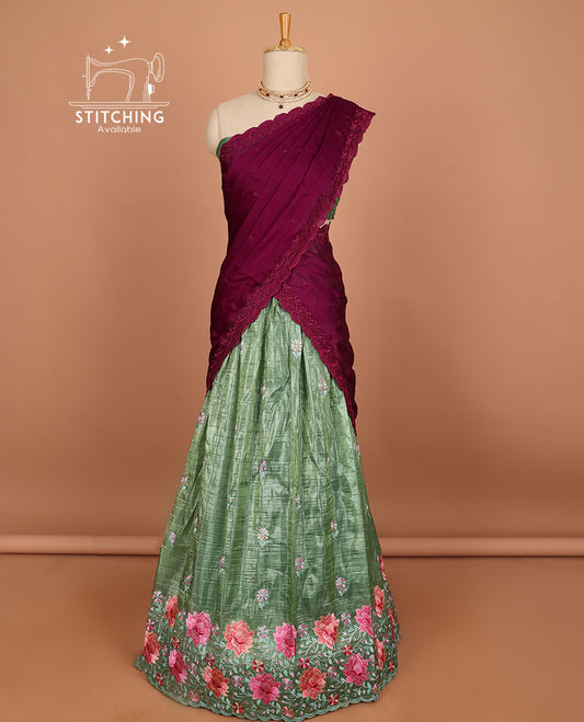 Green buttas half saree with contrast border , zari design blouse & floral buttas , scallop border dhavani
