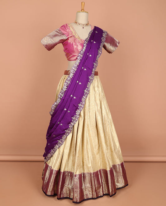 Cream jacquard semi-stitched half saree with contrast zari border,  embroidered blouse & scallop border dhavani