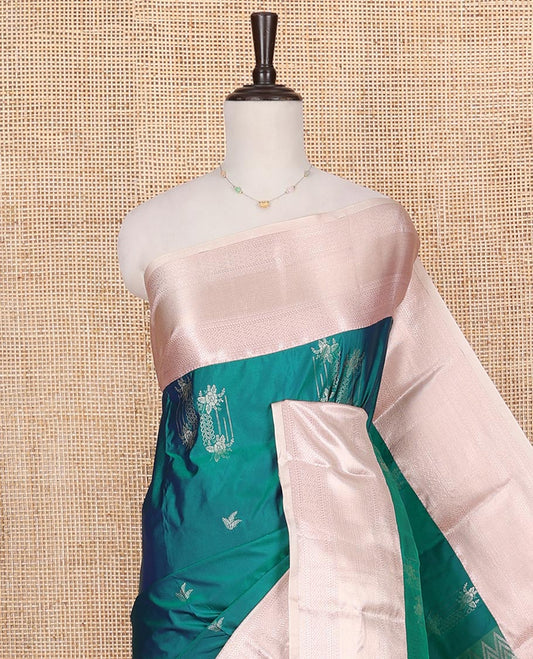 Peacock Blue Budget Silk Saree, Ornamented with Zari Buttas on Its Body, Complemented by a Contrast Traditional Zari Design Border, Chevron Striped Pallu, and Paired with a Contrast Blouse