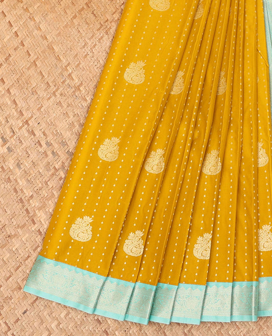 Yellow Budget Silk Saree Beautified with Zari Buttas, Complemented with a Contrast Traditional Zari Design Small Border, Zari Decked Up Pallu of Geometric Designs, and Paired with a Contrast Blouse