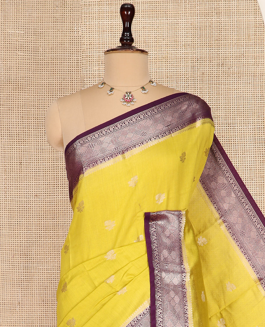 Yellow Assam Silk Saree Prettified with Zari Buttas on Its Body, Complemented by a Contrast Traditional Zari Design Border, a Vibrant Pallu of Zari Stripes, and Paired with a Contrast Blouse