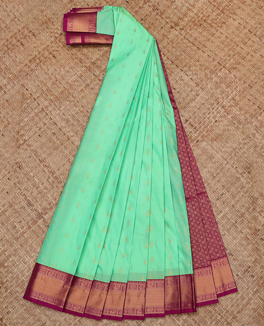 Green Budget Silk Saree, Elevated with Zari Buttas All Over Its Body, Complemented by a Contrast Traditional Peacock-Chakram Zari Border, Grand Butta Enclosed Checked Pallu, and Paired with a Contrast Blouse