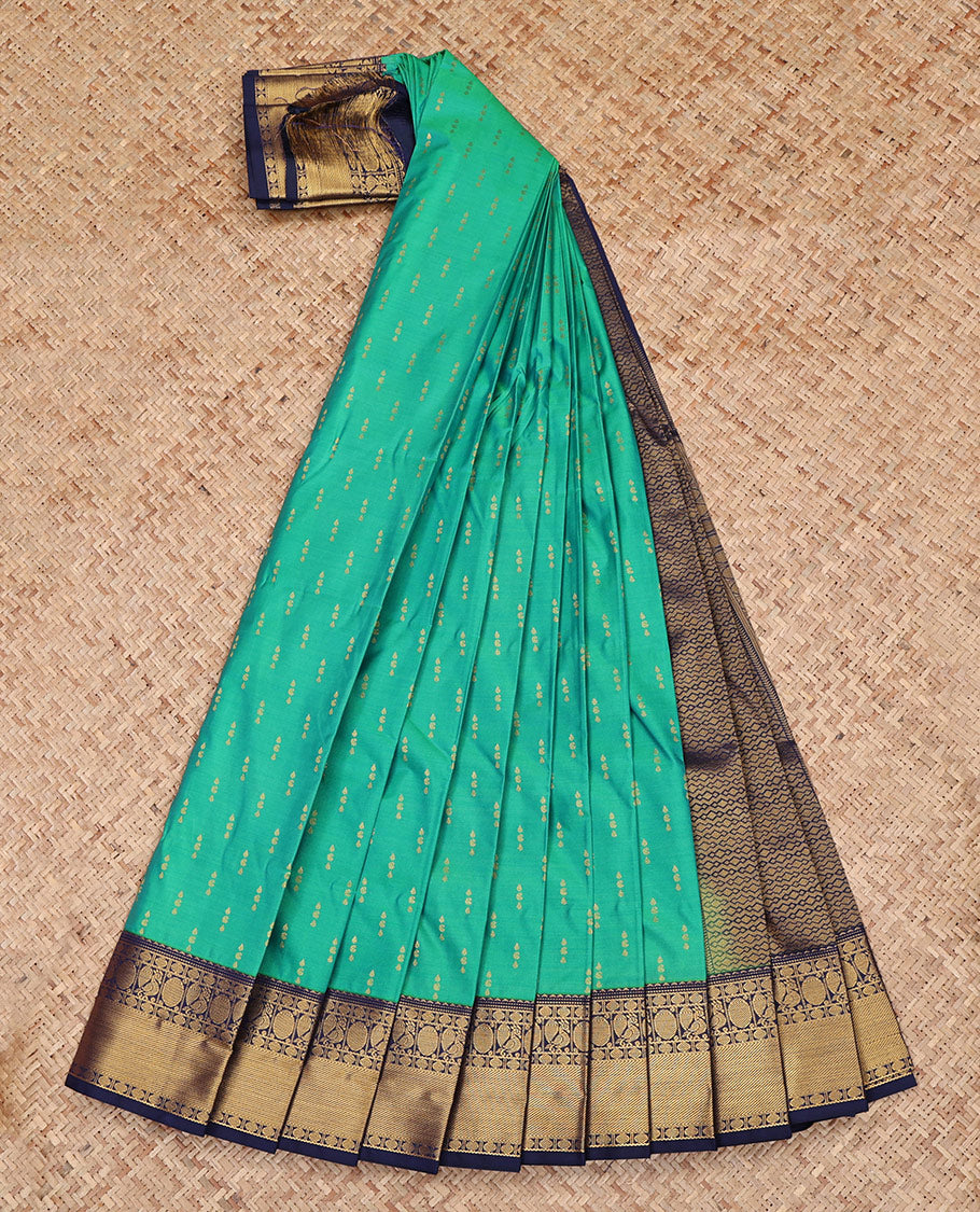Green Budget Silk Saree, Embellished with Zari Buttas All Over Its Body, Complemented by a Contrast Traditional Zari Design Border, Grand Pallu, and Paired with a Contrast Blouse