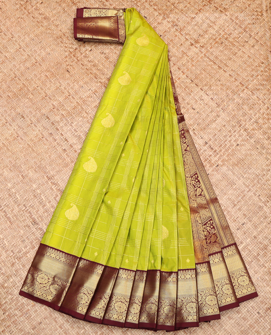 Parrot Green Budget Silk Saree, Opulently Embellished with Zari Butta Enclosed Checked Design on Its Body, Complemented by a Contrast Traditional Zari Design Border, Pallu of Jaal and Paisley Design, and Paired with a Contrast Blouse
