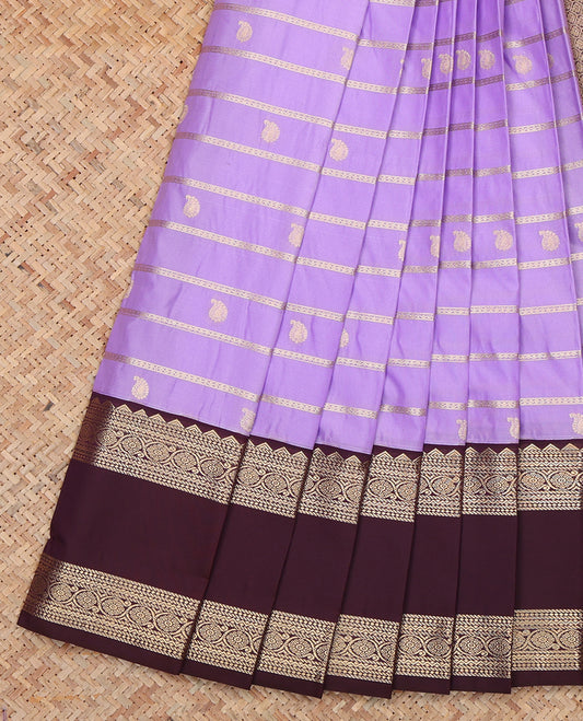 Lavender Budget Silk Saree, Detailed with Zari Buttas and Stripes, a Contrast Traditional Zari Rettai Pettu Border, Grand Pallu, and a Contrast Blouse